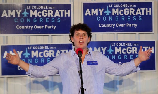 Congressional candidate Amy McGrath speaks at a potluck rally in Frankfort, Ky. Oct. 10, 2018 
