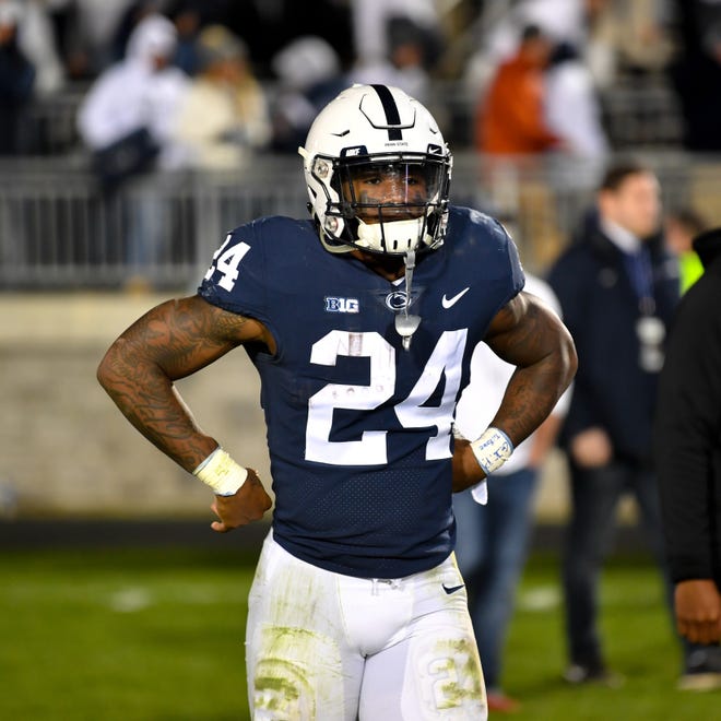 Miles Sanders (24) comes to terms with a tough loss after the Penn State Homecoming game against Michigan State, October 13, 2018. The Nittany Lions fell to the Spartans 17-21.