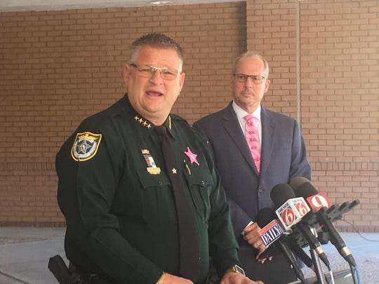 Brevard County Sheriff Wayne Ivey (left) and Brevard Public Schools Superintendent Dr. Mark Mullins speak Monday about the the implementation of the Coach Aaron Feis Guardian / BPS Security Specialist Program.