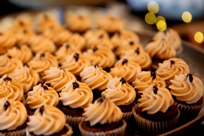 Chocolate cupcakes topped with peanut butter buttercream are offered by Sweetly Baked during the 20th annual Chef's Nite Out, a fundraiser benefiting the Marion-Polk Food Share, at the Salem Convention Center on Sunday, Oct. 14, 2018.