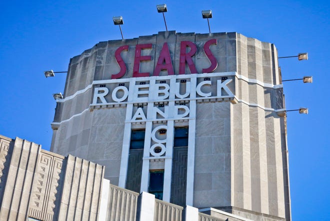 This Wednesday, March 22, 2017, photo, shows Sears signage on its department store in Brooklyn's Flatbush neighborhood, in New York.