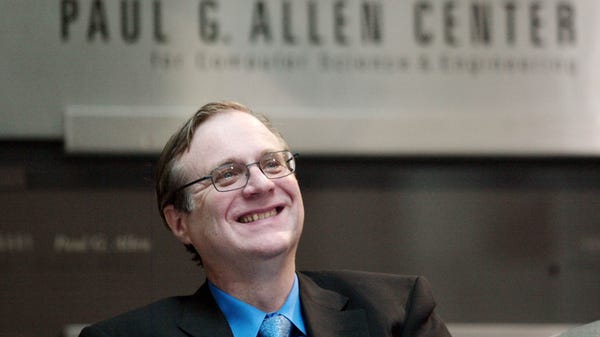Paul Allen, Microsoft co-founder, smiles as he...
