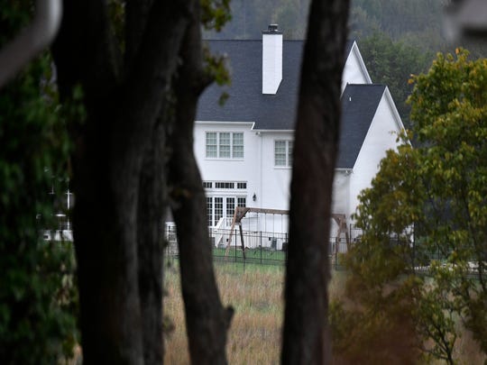 The scene on the morning after what deputies are calling a murder-suicide that took place Monday, Oct. 15, 2018, in Columbia, Tenn. A mother and her four children were found dead at the home.