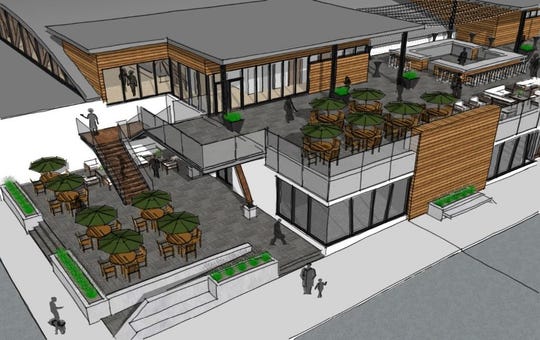 The two-story option of the proposed downtown marketplace at 318 Grand River Ave. includes a roof-top area for a bar or restaurant. The cost difference between this option and just a main-floor venue is $3.2 and $2.7 million.