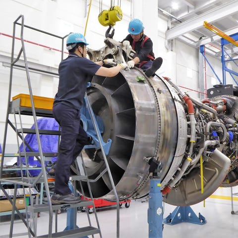 Technicians at work in Korean Air's Engine Test...