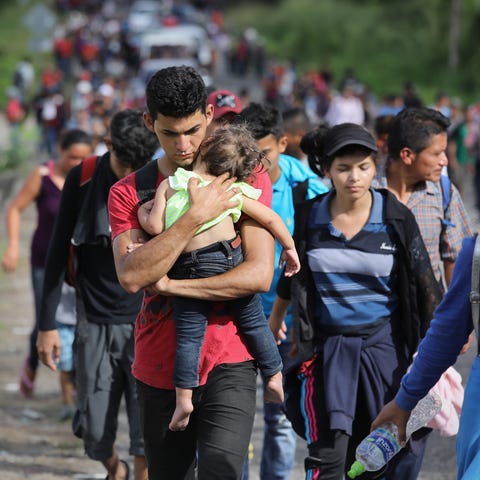 A caravan of more than 1,500 Honduran migrants...