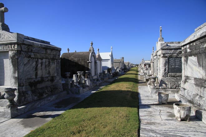 With above-ground graves and mausoleums, New Orleans' St.
Louis Cemetery No. 1 is one of the city's top tourist attractions.