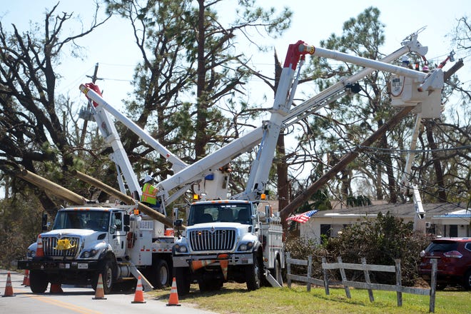 Oct. 15, 2018, Panama City, FL, USA; Linemen from all over the country work 24 hours a day to restore power to the grid in the Florida Panhandle ravaged by Hurricane Michael. Mandatory Credit: Patrick Dove/Treasure Coast News via USA TODAY NETWORK
 (Via OlyDrop)