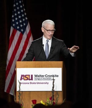 CNN anchor Anderson Cooper speaks after receiving  the annual Cronkite award for excellence in journalism during a luncheon at the Sheraton in Phoenix on October 17, 2018.