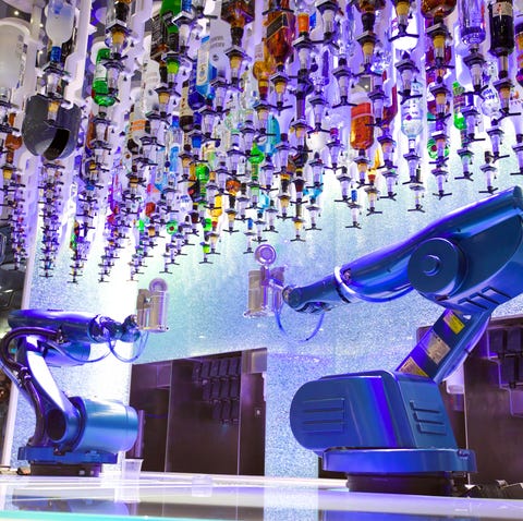 Two robotic arms mix drinks at the Bionic Bar on...