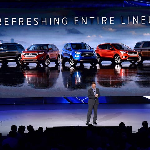 Jim Farley, Ford president of global markets,...