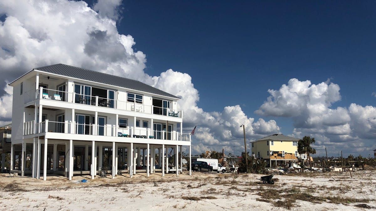Russell King's house stands in Mexico Beach mostly unharmed by Hurricane Michael, a storm which is estimated to have caused $25 billion in damage.