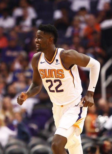 Oct 17, 2018; Phoenix, AZ, USA; Phoenix Suns center Deandre Ayton (22) reacts in the second half against the Dallas Mavericks at Talking Stick Resort Arena. Mandatory Credit: Mark J. Rebilas-USA TODAY Sports