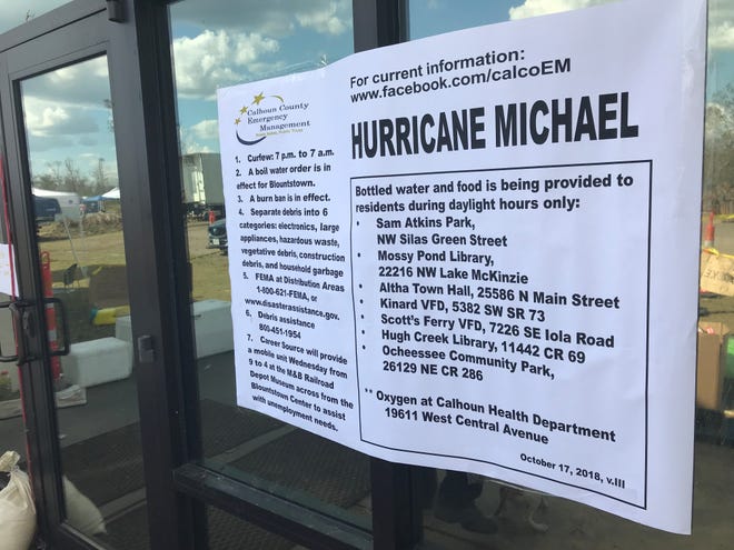 Hurricane Michael notice posted on the front door of the Mossy Pond Public Library and Community Center.