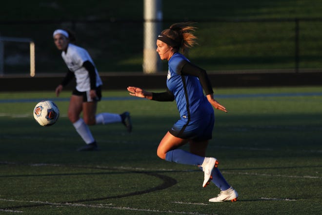 Zanesville's Melena Moore works the ball upfield against Tri-Valley during her junior season. Moore committed to play at Marietta on Friday.