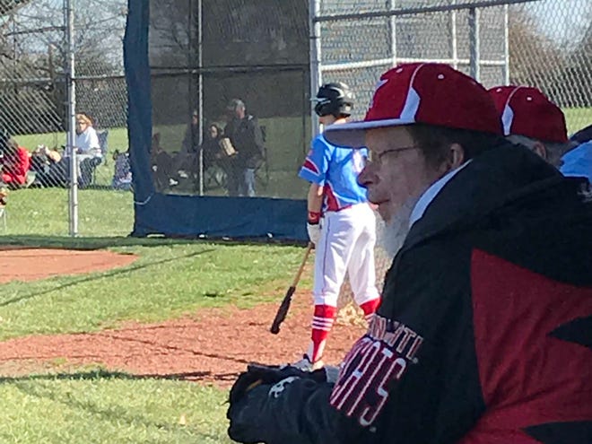 Retired Marion Star sports writer stays busy in the spring by keeping the scorebook for the Ridgedale baseball team.