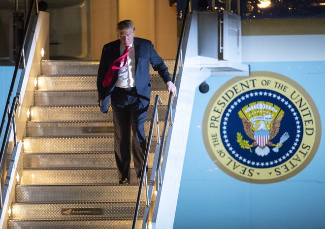 President Trump walks off Air Force One after arriving at Phoenix Sky Harbor Airport Oct. 18, 2018. The president is in the Phoenix area for events on Friday including a rally in Mesa for Republican senate candidate Martha McSally.