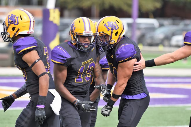 Hardin-Simmons' Kelton McGee (19) is congratulated after a special teams tackle against Texas Lutheran at Shelton Stadium on Saturday, Oct. 20, 2018.