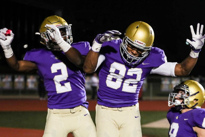 October 19 2018 - Christian Brothers' Will Ruth, 2, and Antonio Lay, 82, celebrate a touchdown during Friday night's game versus Wooddale at Christian Brothers High School.