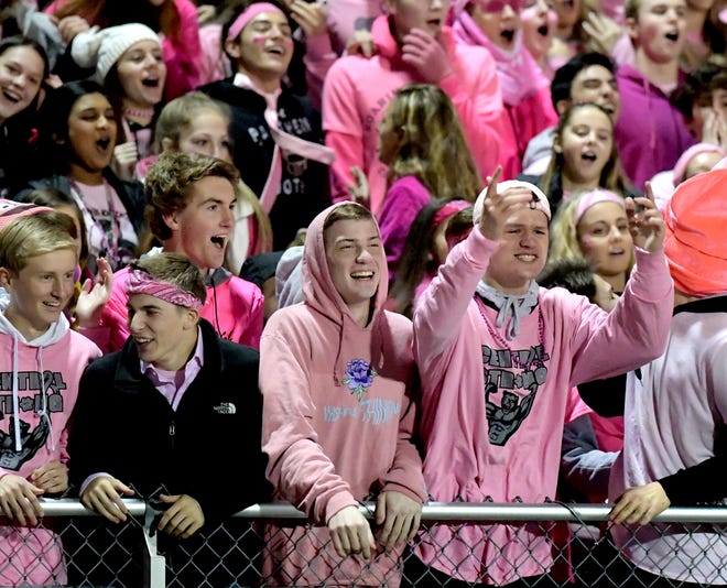 Central York students at the 2018 Pink Out game show support for breast cancer with Pink shirts in a file photo. This year, the players and coaches will wear pink gear on the field as well.