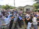 Police try to prevent hundreds of Honduran migrants to cross a police checkpoint to Guatemala, at the Agua Caliente border crossing, in Ocotepeque, Honduras on Oct. 19, 2018.