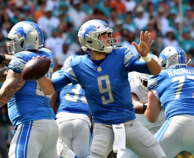Lions quarterback Matthew Stafford throws a pass against the Dolphins during the first half on Sunday, Oct. 21, 2018, in Miami Gardens, Fla.