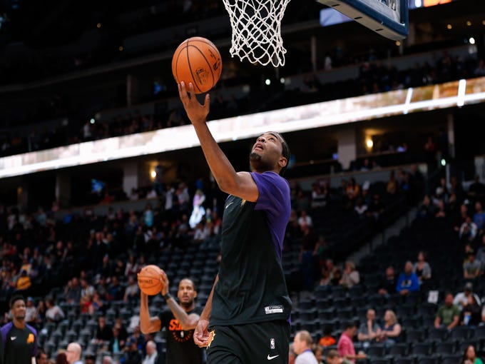 Oct 20, 2018; Denver, CO, USA; Phoenix Suns forward TJ Warren (12) warms up before the game against the Denver Nuggets at the Pepsi Center. Mandatory Credit: Isaiah J. Downing-USA TODAY Sports