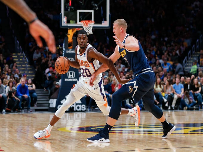 Oct 20, 2018; Denver, CO, USA; Denver Nuggets forward Mason Plumlee (24) guards Phoenix Suns forward Josh Jackson (20) in the fourth quarter at the Pepsi Center. Mandatory Credit: Isaiah J. Downing-USA TODAY Sports