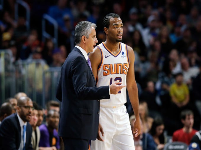 Oct 20, 2018; Denver, CO, USA; Phoenix Suns head coach Igor Kokoskov talks with forward TJ Warren (12) in the third quarter against the Denver Nuggets at the Pepsi Center. Mandatory Credit: Isaiah J. Downing-USA TODAY Sports
