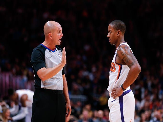 Oct 20, 2018; Denver, CO, USA; Referee Jacyn Goble (68) talks with Phoenix Suns guard Isaiah Canaan (0) in the second quarter against the Denver Nuggets at the Pepsi Center. Mandatory Credit: Isaiah J. Downing-USA TODAY Sports