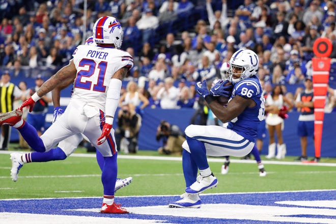 Indianapolis Colts tight end Erik Swoope (86) makes a catch for a touchdown in front of Buffalo Bills free safety Jordan Poyer (21) during the first half of an NFL football game in Indianapolis, Sunday, Oct. 21, 2018. (AP Photo/John Minchillo)