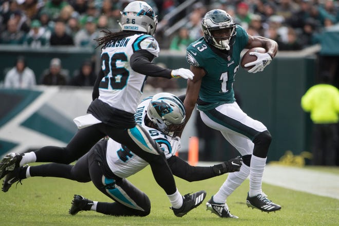 Eagles wide receiver Nelson Agholor fights off the Carolina defense at Lincoln Financial Field on Oct. 21. Agholor is averaging just 9.1 yards per reception this season.