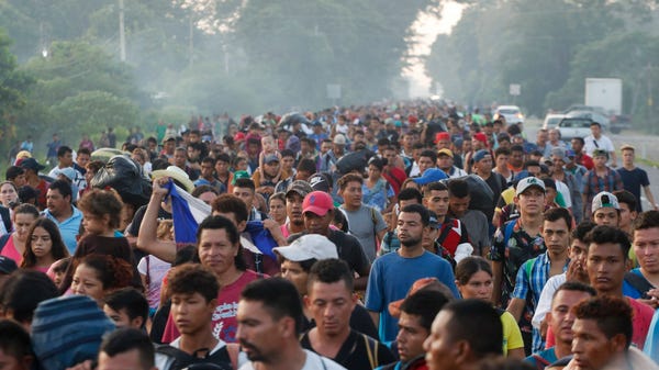 Central American migrants walking to the U.S....
