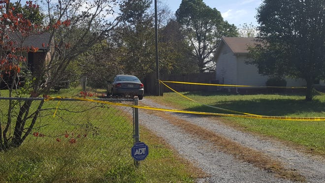 The driveway where Leila Chanane was found dead. Her estranged husband, Hamid Houbbadi, was found inside the victim's home with self-inflicted injuries and has been charged in her death.