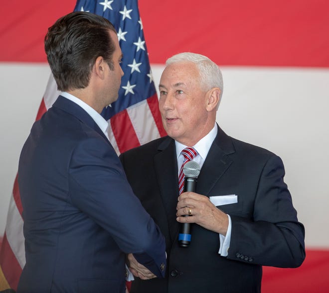 Greg Pence (right), shakes the hand of Donald Trump Jr. who came to lobby for Mike Braun and Pence, who are running for office on Nov. 6, Indianapolis Regional Airport in Greenfield, Monday, Oct. 22, 2018. 