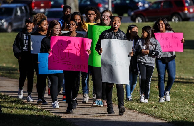 Chanese Knox (center) leads a student protest in front of Greendale High School on Monday, Oct. 22, 2018, in reaction to a racial-slur incident.