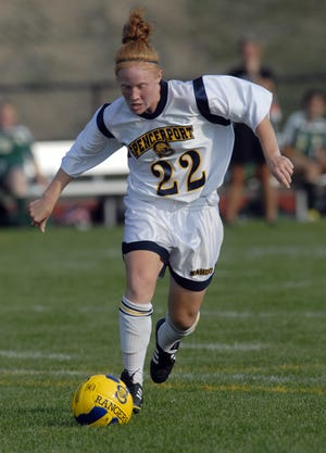 Spencerport Rangers soccer standout Brittany Kinmond (22) dribbles up field during action against Rush-Henrietta in Spencerport Thursday afternoon, September 4, 2008. Kinmond was a three-time AGR selection and two-time Player of the Year (2008 and '09.