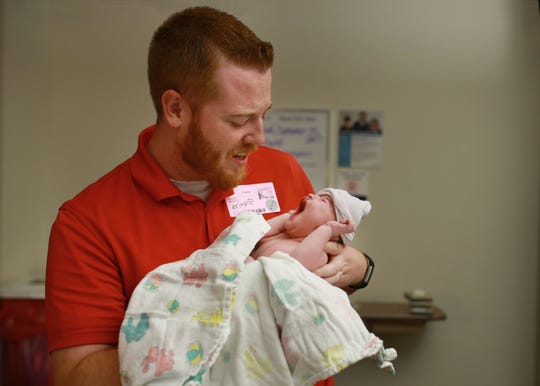 An On Angels' Wings photographer took this photo of Tom and Owen Masterson shortly after Owen was born.