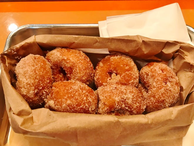 Bluewater Beach Grill's mini doughnuts were dusted with cinnamon and sugar and served in a brown bag.