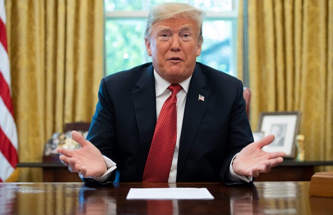 President Donald Trump speaks during a meeting about cutting business regulations in the Oval Office of the White House in Washington, on Oct. 17, 2018.