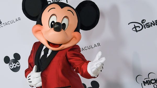 Mickey Mouse poses during Mickey's 90th...