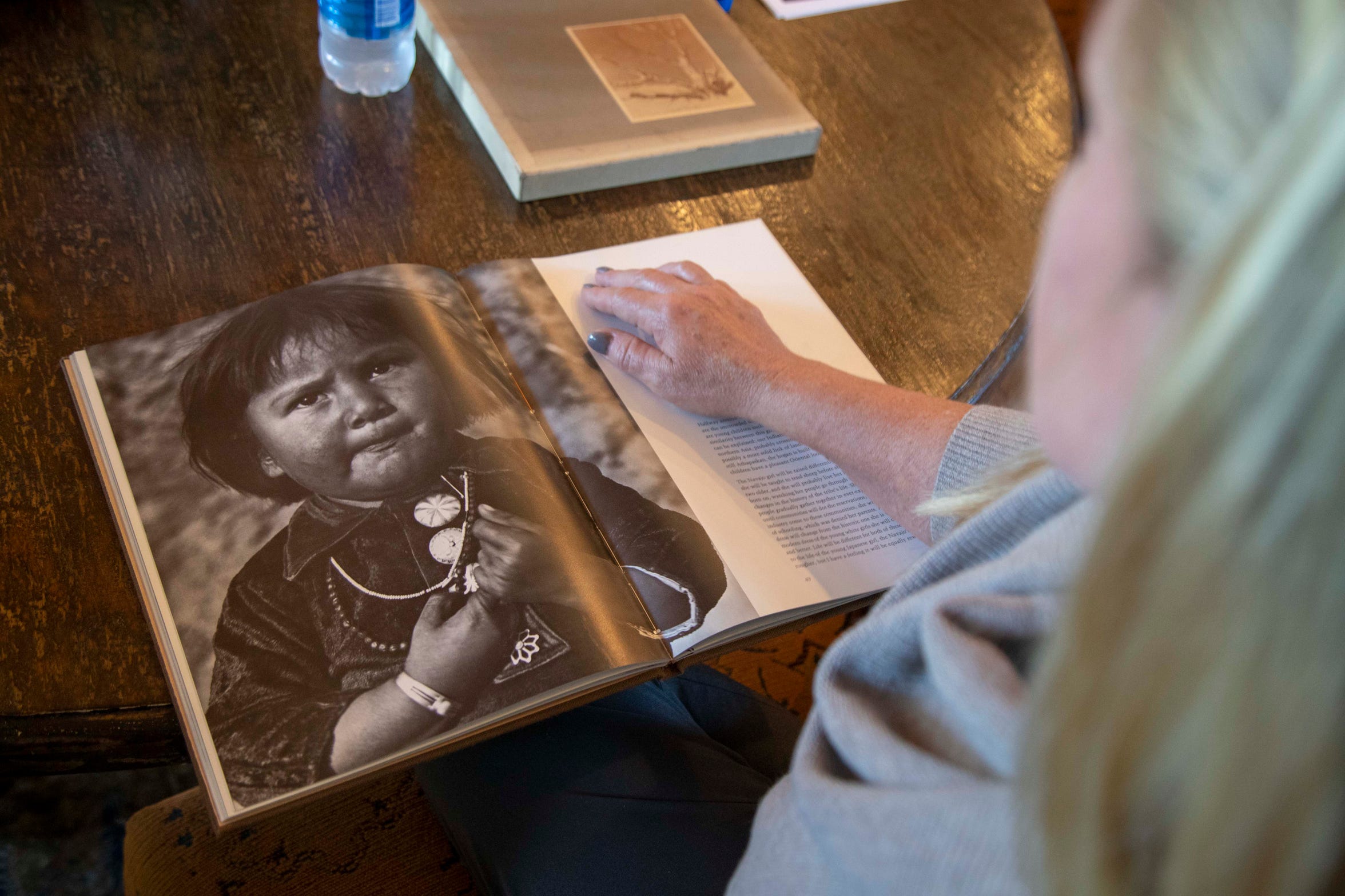 Alison Goldwater shows a photograph of natives taken by her grandfather Barry Goldwater. Alison Goldwater and her family is getting ready to release an archive of photos taken by Barry Goldwater throughout his life and created a library and foundation to honor his legacy. 