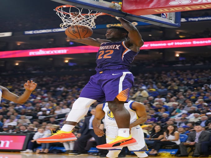 October 22, 2018; Oakland, CA, USA; Phoenix Suns center Deandre Ayton (22) dunks the basketball against the Golden State Warriors during the second quarter at Oracle Arena. Mandatory Credit: Kyle Terada-USA TODAY Sports