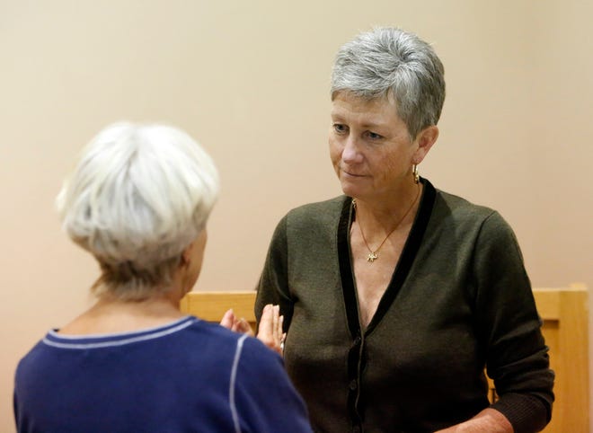 Grand Canyon National Park Superintendent Christine Lehnertz (right) speaks with a member of the public at an October 2017 event at the Museum of Northern Arizona in Flagstaff.