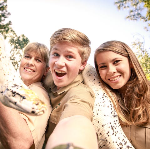 Terri, left, Robert and Bindi Irwin pose for a sel