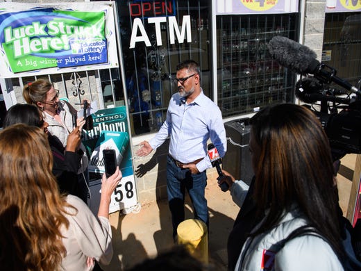 C.J. Patel, owner of the KC Mart #7 at 303 Lee Vaughn Road in Simpsonville, talks to the media on Wednesday, Oct. 24, 2018, after South Carolina Education Lottery officials announced where the winning Mega Millions jackpot ticket was sold.