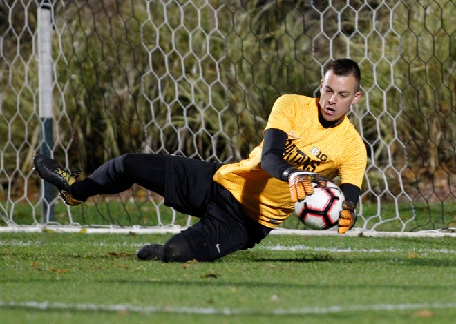 Michigan State goalkeeper Jimmy Hague makes a stop against Michigan, Tuesday, Oct. 23, 2018, in East Lansing, Mich. The teams played to a 1-1 draw.