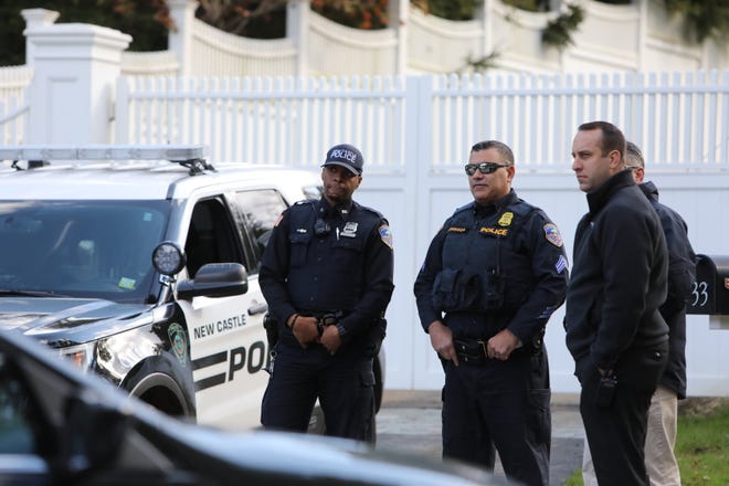 Polilce officers outside Hillary and  Bill Clinton's home in Chappaqua, New York, after an explosive device sent to Hillary Clinton was intercepted, Wednesday, Oct. 24, 2018.
