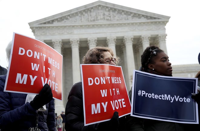Protesters gather during a rally in front of the Supreme Court in January.