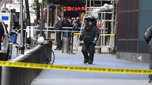 NYPD officers outside Time Warner building in...